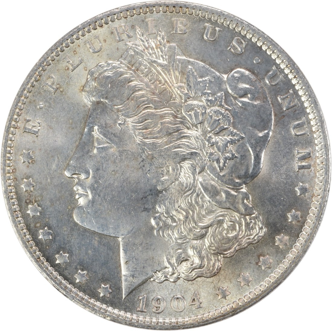 1904-O Morgan Dollar Silver Choice Brilliant Uncirculated Uncertified Coin: 1904-O Morgan Dollar Silver Choice Brilliant Uncirculated Uncertified Coin This is a 1904-O Morgan Silver Dollar from the New Orleans Mint, featuring a Choice Brilliant Uncirculated (BU) grade. The co