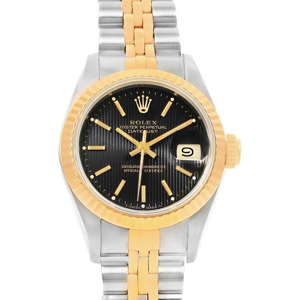 Rolex Datejust Lady 69173 Black Tapestry Dial Jubilee Bracelet with Papers 1994: Rolex Datejust Lady 69173 Black Tapestry Dial Jubilee Bracelet with Papers 1994 This Rolex Datejust Lady features a black tapestry dial, a fluted bezel, and is fitted with a Jubilee bracelet. The watc