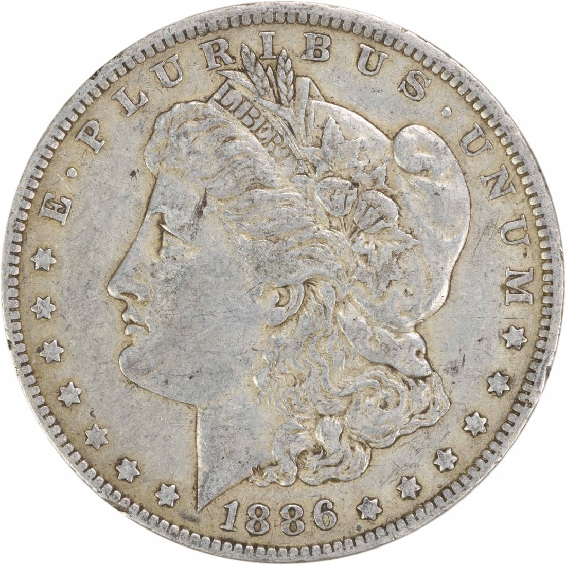 1886 New Orleans Morgan Dollar EF Grade 90 Percent Silver Uncertified: 1886 New Orleans Morgan Dollar EF Grade 90 Percent Silver Uncertified This is an 1886-O Morgan Silver Dollar featuring the classic design by George T. Morgan. Struck at the New Orleans Mint, this circ