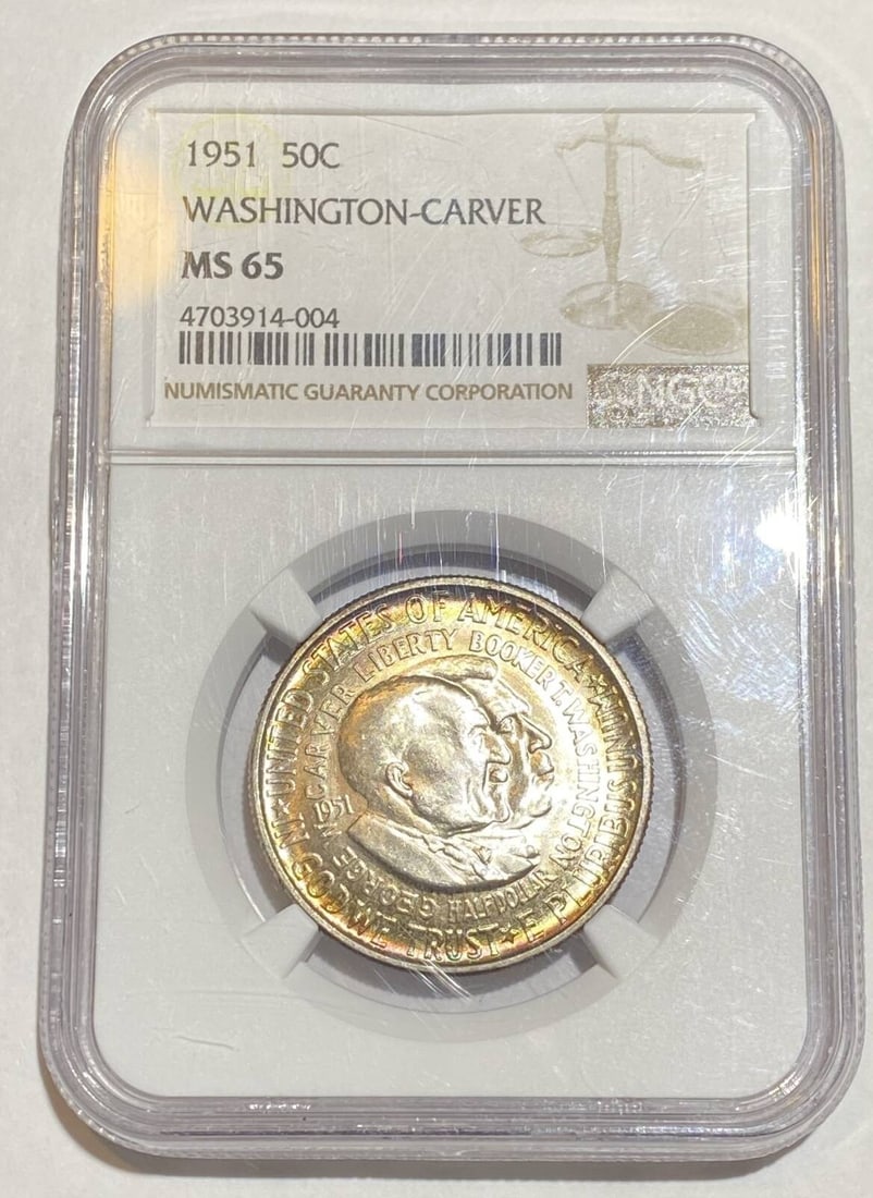 1951 Philadelphia Washington Carver Silver Dollar NGC MS65 Rainbow Toning: 1951 Philadelphia Washington Carver Silver Dollar NGC MS65 Rainbow Toning This 1951 Washington Carver dollar is graded MS-65 by NGC and features attractive rainbow toning. Struck in silver at the Phil
