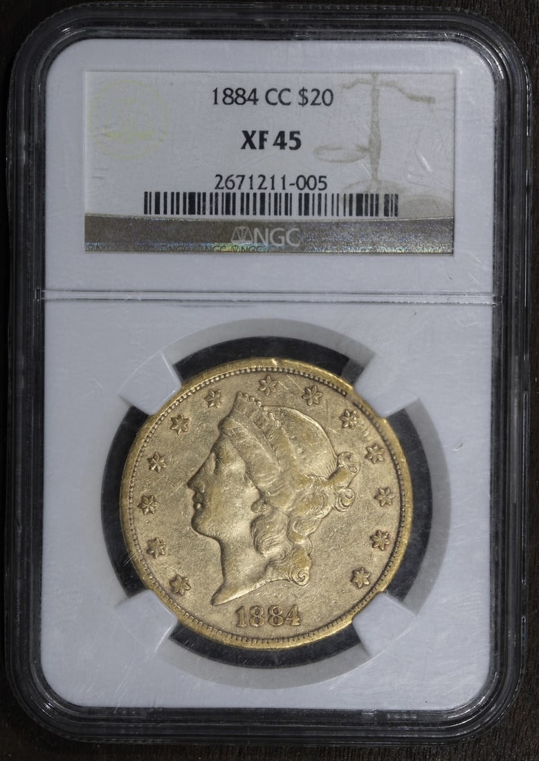 1884-CC Carson City Gold Double Eagle $20 NGC XF45: 1884-CC Carson City Gold Double Eagle $20 NGC XF45 This 1884-CC Liberty Head Gold Double Eagle is a $20 coin minted in Carson City. Composed of gold with a fineness of 0.9, it is graded XF45, indicati