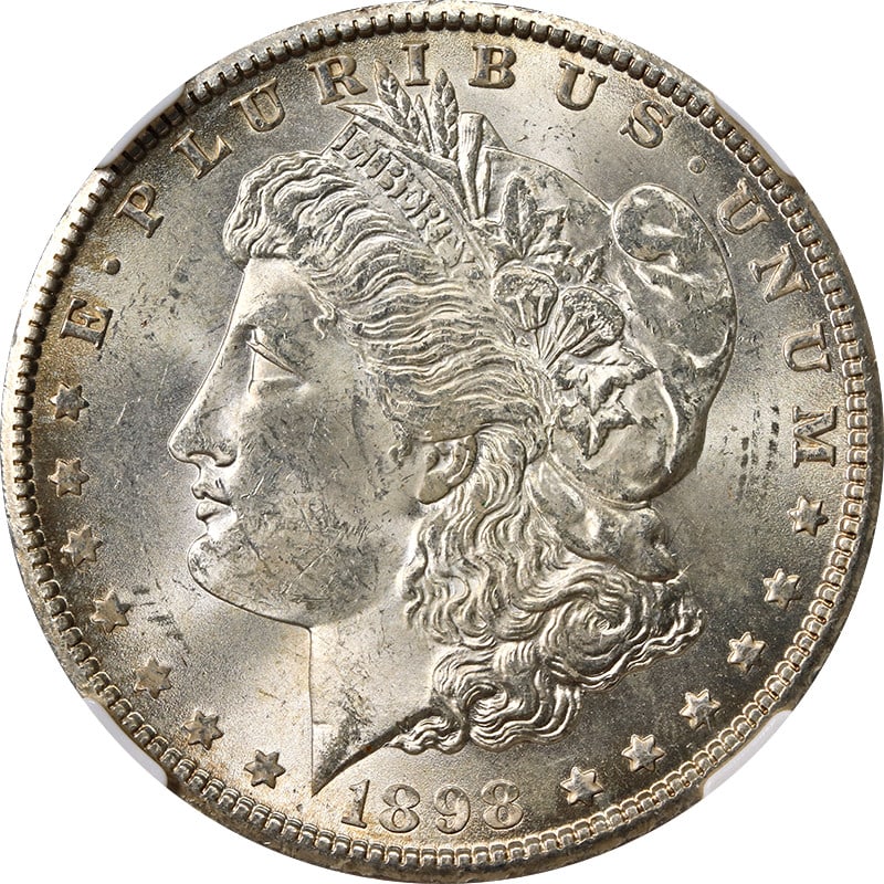 NGC MS63 1898-O Morgan Silver Dollar with Attractive Toning: NGC MS63 1898-O Morgan Silver Dollar with Attractive Toning This 1898-O Morgan Silver Dollar is certified by NGC with a grade of MS63. The coin features attractive toning and was struck at the New Orl
