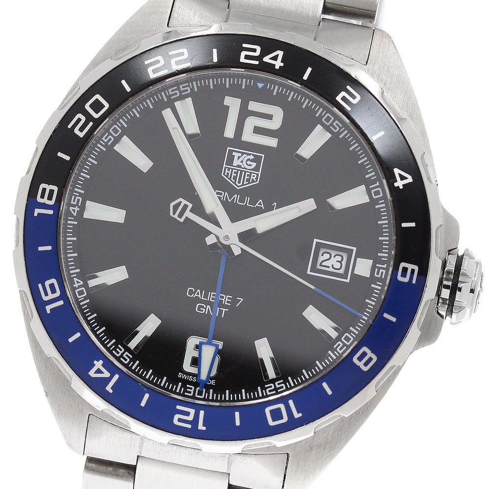 TAG Heuer Formula 1 Caliber 7 GMT WAZ211A Mens Wristwatch: TAG Heuer Formula 1 Caliber 7 GMT WAZ211A Mens Wristwatch TAG Heuer Formula 1 Caliber 7 GMT men's wristwatch, pre-owned and made in Switzerland. This watch is identified as model WAZ211A and is part o