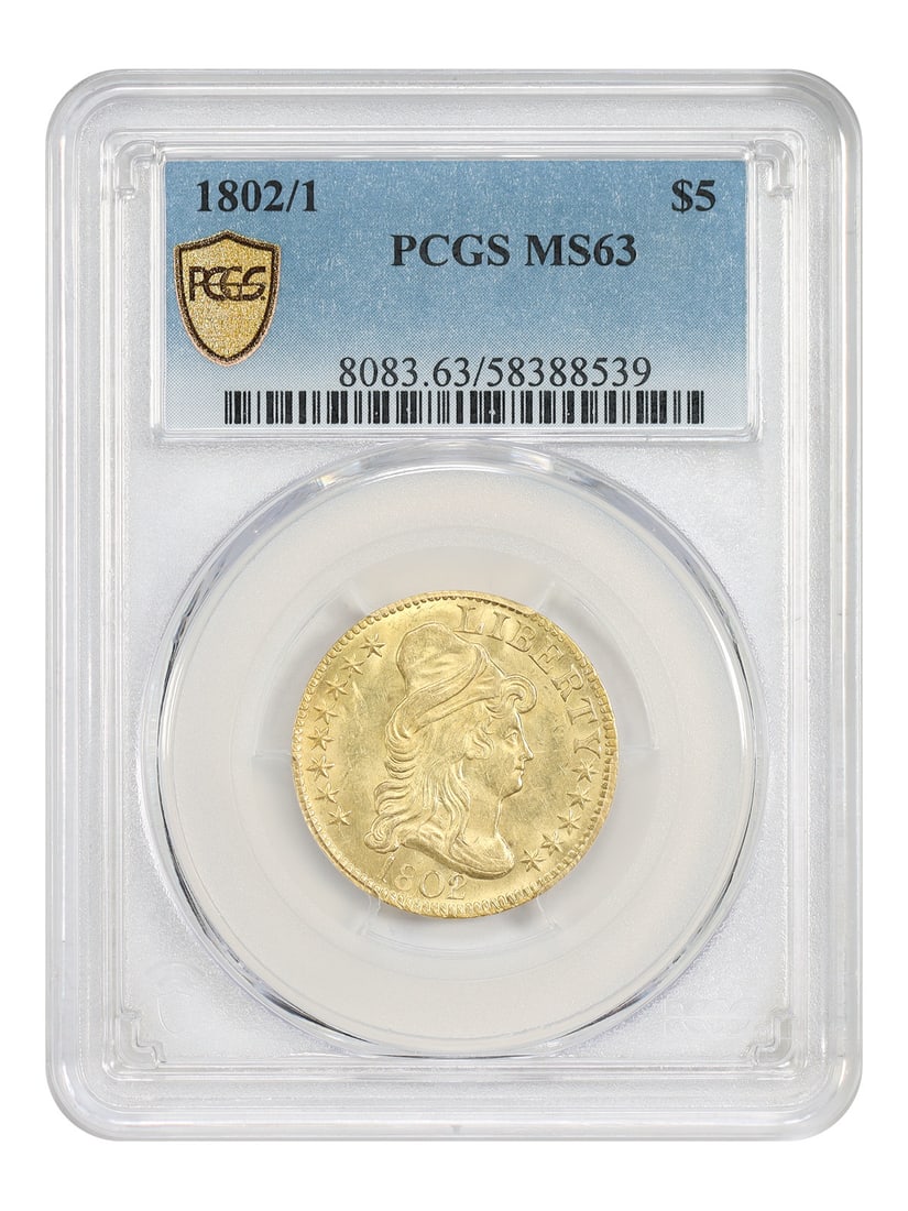 1802 Draped Bust $5 Gold Coin PCGS MS63 Overdate: 1802 Draped Bust $5 Gold Coin PCGS MS63 Overdate An 1802/1 Draped Bust $5 gold coin certified by PCGS and graded MS63. Struck in Philadelphia, this uncirculated example displays gleaming satin-like lu