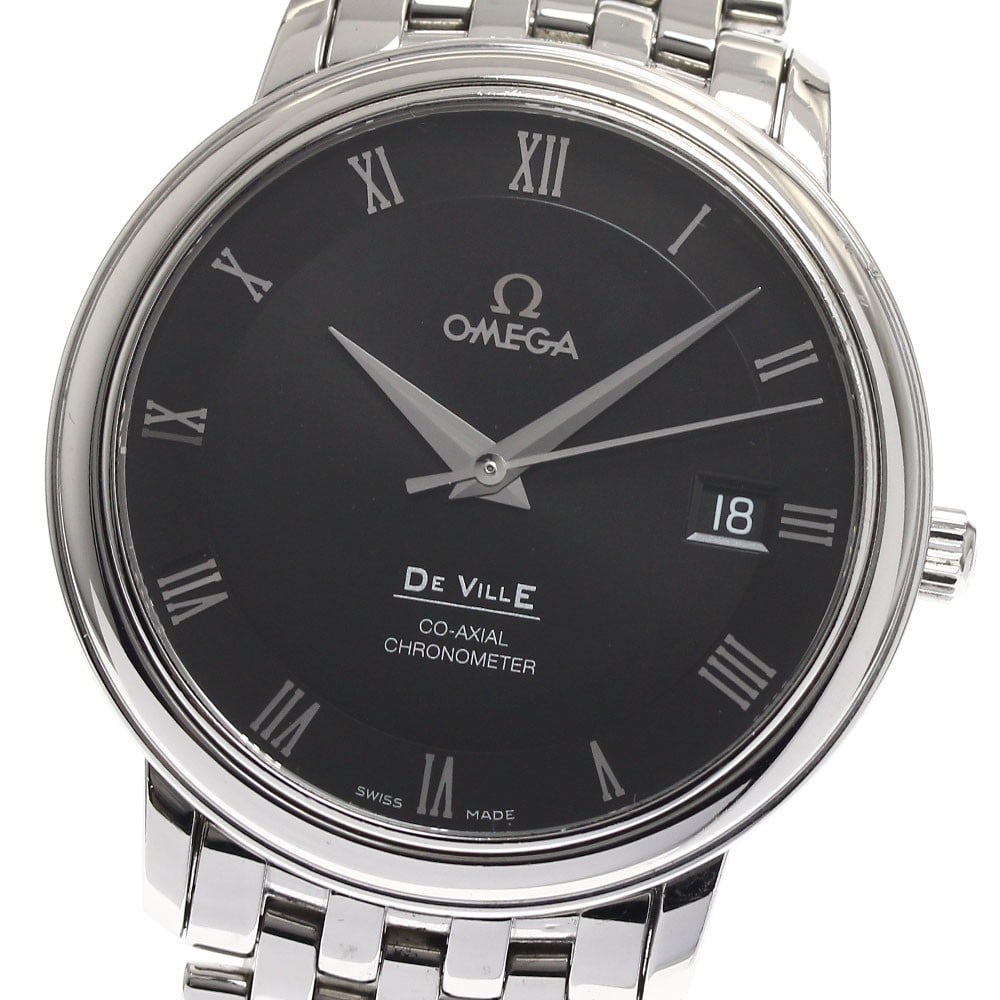 OMEGA De Ville Prestige 4574.50 Co-Axial Date Wristwatch: OMEGA De Ville Prestige 4574.50 Co-Axial Date Wristwatch OMEGA De Ville Prestige Co-Axial Date men's wristwatch in pre-owned condition. This Swiss-made watch is identified by reference 4574.50 and fea