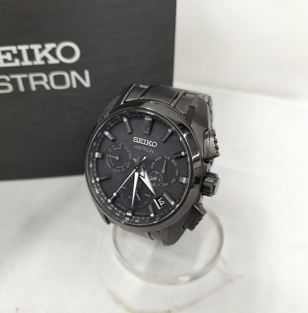 Mens SEIKO Astron GPS Solar Wristwatch Black Titanium 5X53-0AV0: Mens SEIKO Astron GPS Solar Wristwatch Black Titanium 5X53-0AV0 A pre-owned Seiko Astron men's wristwatch with GPS Solar functionality and a black titanium case and bracelet. Made in Japan, this watch
