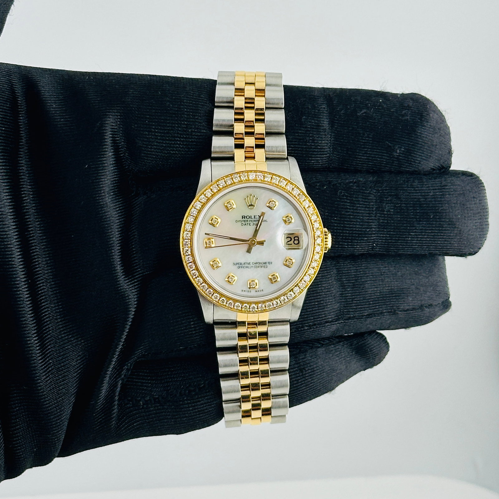Rolex Ladies Datejust 68273 White MOP Diamond Dial Jubilee Aftermarket: Rolex Ladies Datejust 68273 White MOP Diamond Dial Jubilee Aftermarket This ladies Rolex Datejust features a white mother of pearl dial set with diamond hour markers and is presented on a Jubilee brac