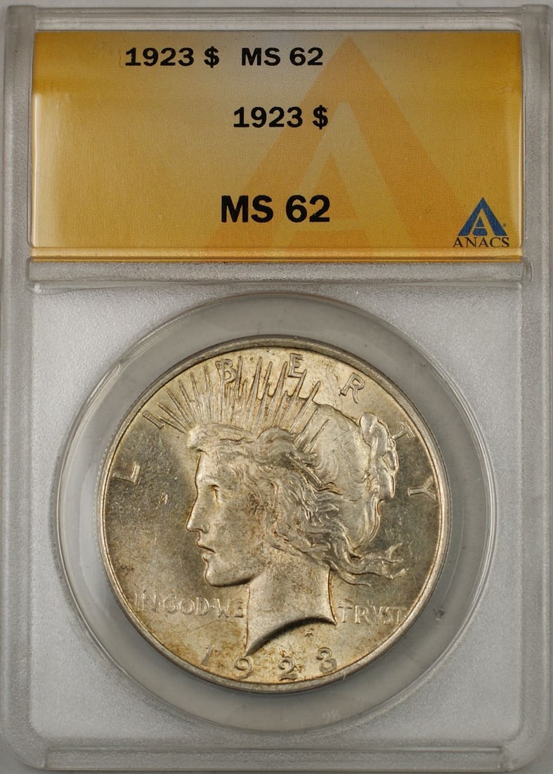 1923 ANACS MS-62 Peace Dollar Silver Coin from Philadelphia Mint: 1923 ANACS MS-62 Peace Dollar Silver Coin from Philadelphia Mint This is a 1923 Peace Silver Dollar coin from the United States, certified by ANACS with a grade of MS 62. The coin is uncirculated and 