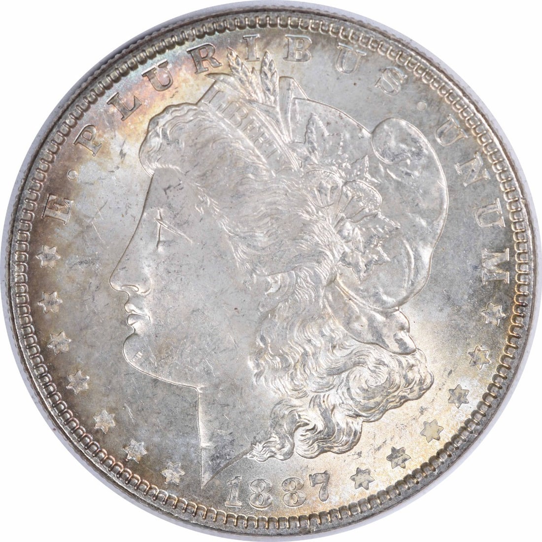 Choice BU 1887 Silver Morgan Dollar Uncertified With Toning: Choice BU 1887 Silver Morgan Dollar Uncertified With Toning This 1887 Morgan Silver Dollar features a beautiful toned appearance and is in Choice Brilliant Uncirculated (BU) condition. The coin is com