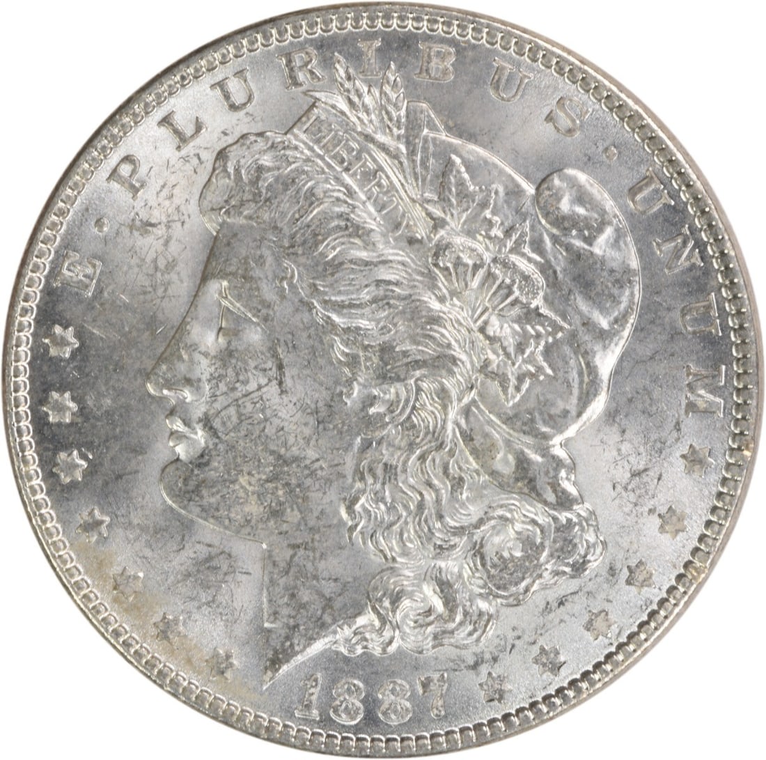 Uncirculated 1887 Silver Morgan Dollar Choice BU No Mint Mark: Uncirculated 1887 Silver Morgan Dollar Choice BU No Mint Mark This is an 1887 Morgan Silver Dollar from the United States, featuring a Choice Brilliant Uncirculated (BU) grade. The coin is uncirculate