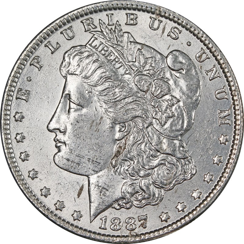 1887 P Morgan Dollar Silver VAM 5 Doubled Date: 1887 P Morgan Dollar Silver VAM 5 Doubled Date 1887-P Morgan Silver Dollar featuring the VAM 5 Doubled Date variety. The coin is circulated, pre-owned, and uncertified, with a silver composition and U