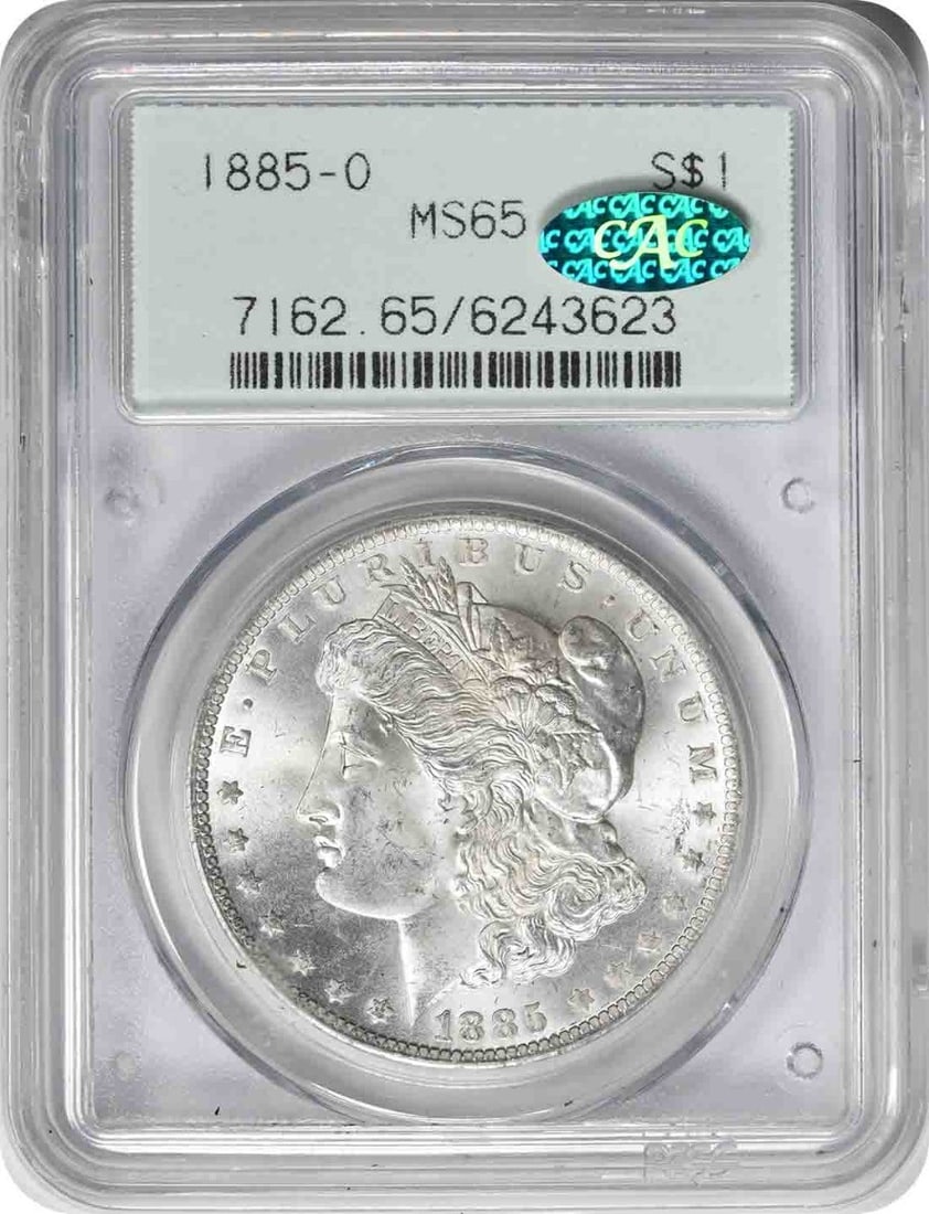 PCGS MS65 1885 O Morgan Silver Dollar OGH CAC: PCGS MS65 1885 O Morgan Silver Dollar OGH CAC 1885-O Morgan Silver Dollar graded MS65 by PCGS. This uncirculated coin is composed of 90% silver and 10% copper, with a reeded edge. It is a United State