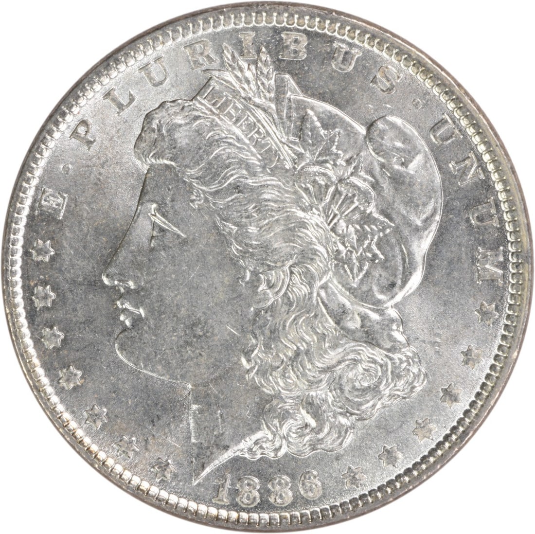 Choice BU 1886 Silver Morgan Dollar Uncertified Uncirculated Coin: Choice BU 1886 Silver Morgan Dollar Uncertified Uncirculated Coin This 1886 Morgan Silver Dollar features a Choice Brilliant Uncirculated (BU) grade and is uncertified. The coin is composed of silver 