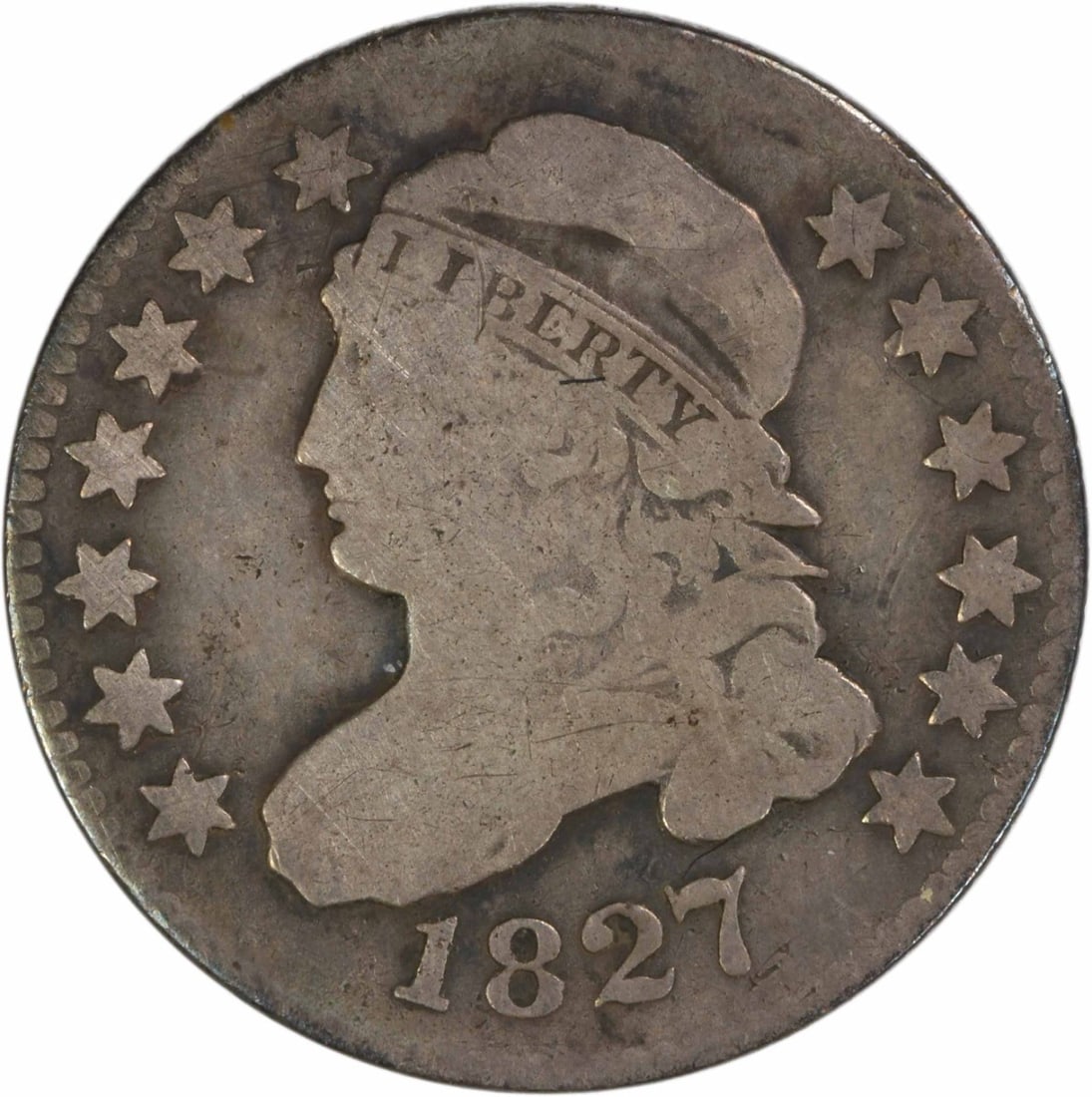 1827 Capped Bust Dime Philadelphia Circulated Uncertified Silver Coin: 1827 Capped Bust Dime Philadelphia Circulated Uncertified Silver Coin This 1827 Capped Bust silver dime is a circulated coin from the Philadelphia Mint. Designed by John Reich, it features a compositi