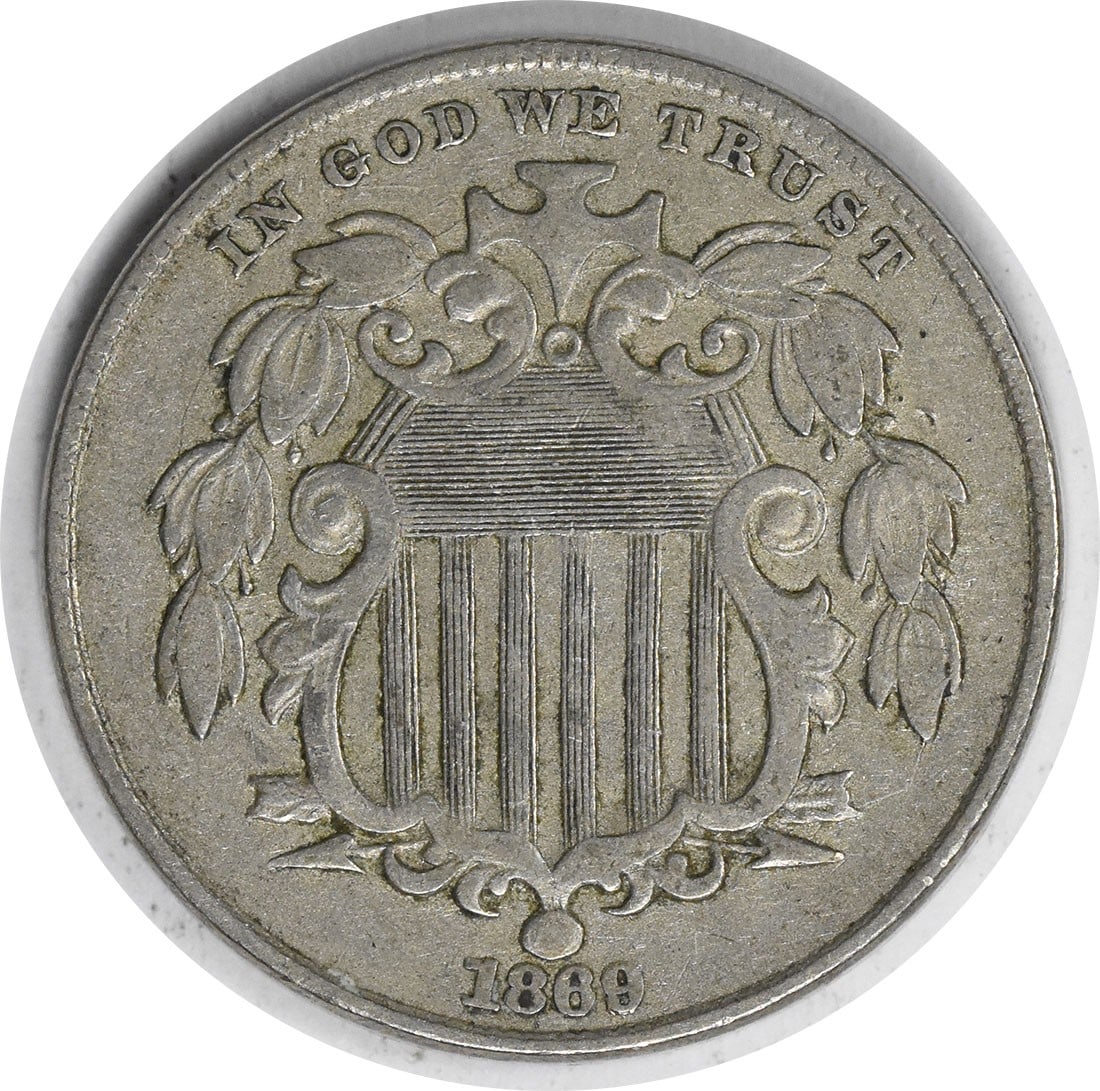 1869 Shield Nickel 5C XF Uncertified Philadelphia Mint: 1869 Shield Nickel 5C XF Uncertified Philadelphia Mint This 1869 Shield Nickel is a remarkable piece of numismatic history, featuring the design by James Barton Longacre. Struck in Philadelphia, this 