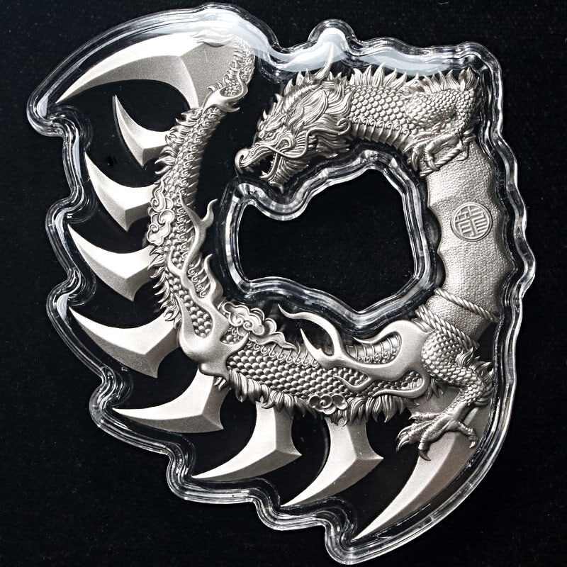 2026 Samoa 5 Ounce Silver Dragon Claw Knife OGP: 2026 Samoa 5 Ounce Silver Dragon Claw Knife OGP This 2026 Samoa 5 Ounce Silver Dragon Claw Knife is crafted from .999 fine silver and comes in its original government packaging (OGP). The piece is unc