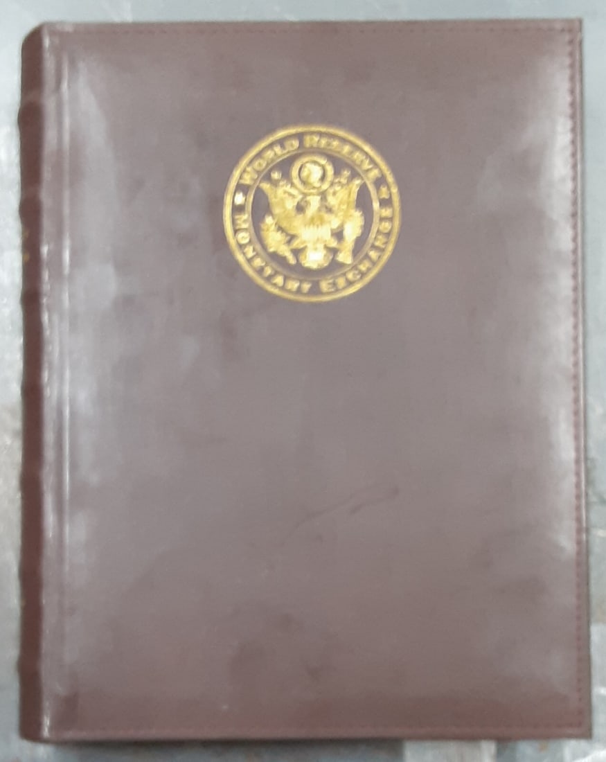 Album for Four US Currency Subject Sheets by World Reserve Monetary Exchange: Album for Four US Currency Subject Sheets by World Reserve Monetary Exchange This pre-owned currency album from the World Reserve Monetary Exchange is designed to hold 4 subject sheets of U.S. currenc