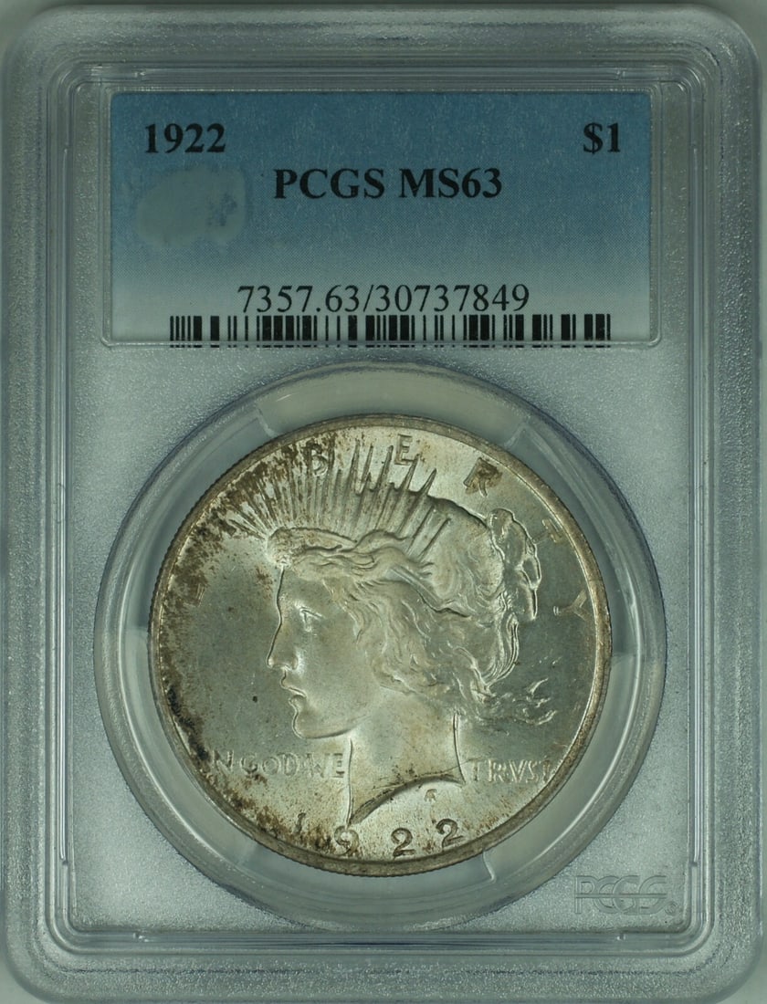 PCGS MS63 1922 Peace Dollar Toned Silver Coin: PCGS MS63 1922 Peace Dollar Toned Silver Coin This 1922 Peace Silver Dollar is graded MS-63 by PCGS and was minted in Philadelphia. Composed of silver, this uncirculated coin is a notable collectible 