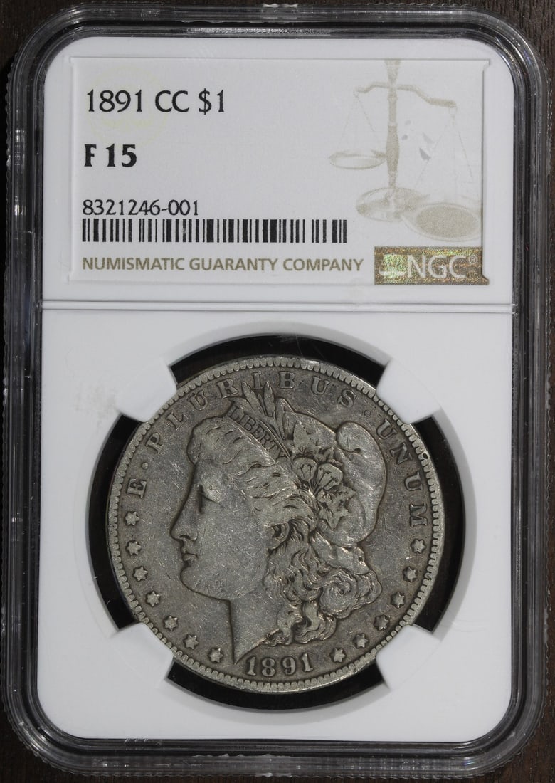 Carson City 1891-CC Morgan Silver Dollar NGC F15: Carson City 1891-CC Morgan Silver Dollar NGC F15 This is an 1891 Morgan Silver Dollar with a Carson City mint mark, graded F15. The coin is composed of 90% silver and was minted in Carson City, United