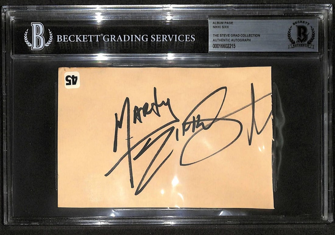 Beckett slabbed Nikki Sixx autograph album page: Beckett slabbed Nikki Sixx autograph album page This is a pre-owned album page autographed by Nikki Sixx, founding member and bassist of Motley Crue. The signed album page is encapsulated in a Beckett