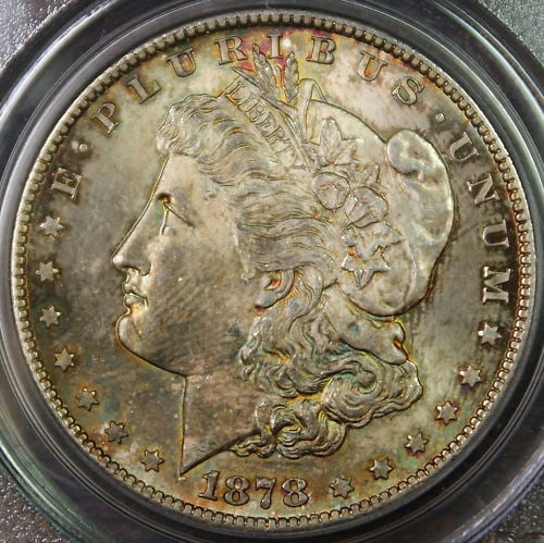 PCGS MS63 1878 San Francisco Morgan Silver Dollar with Attractive Toning: PCGS MS63 1878 San Francisco Morgan Silver Dollar with Attractive Toning This is an 1878-S Morgan Silver Dollar coin from the San Francisco Mint, certified by PCGS with a grade of MS-63. The coin is u