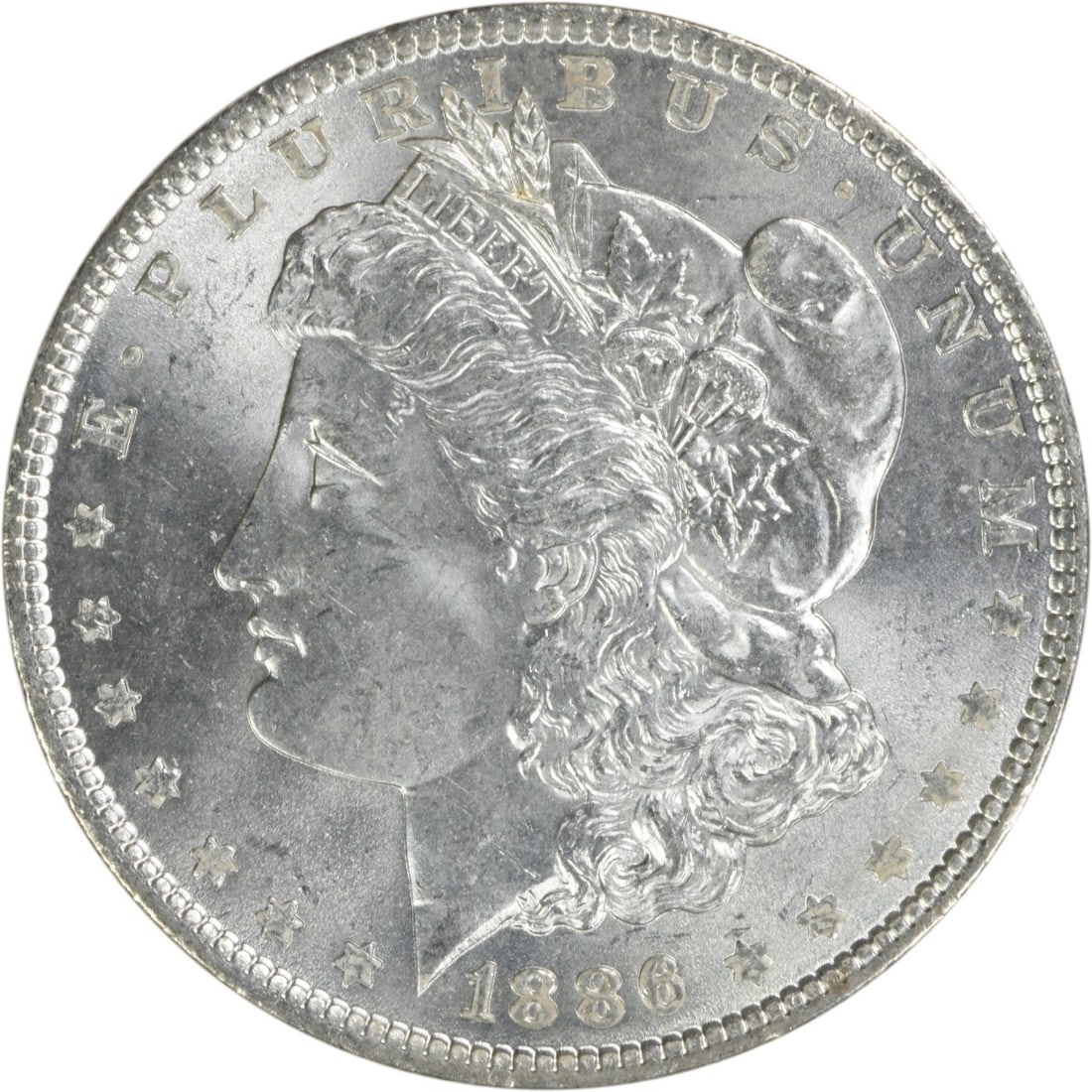 Choice BU 1886 Silver Dollar Morgan Uncirculated Uncertified: Choice BU 1886 Silver Dollar Morgan Uncirculated Uncertified This 1886 Morgan Silver Dollar is a Choice Brilliant Uncirculated example, featuring no mint mark. Struck in silver, it is an uncirculated 