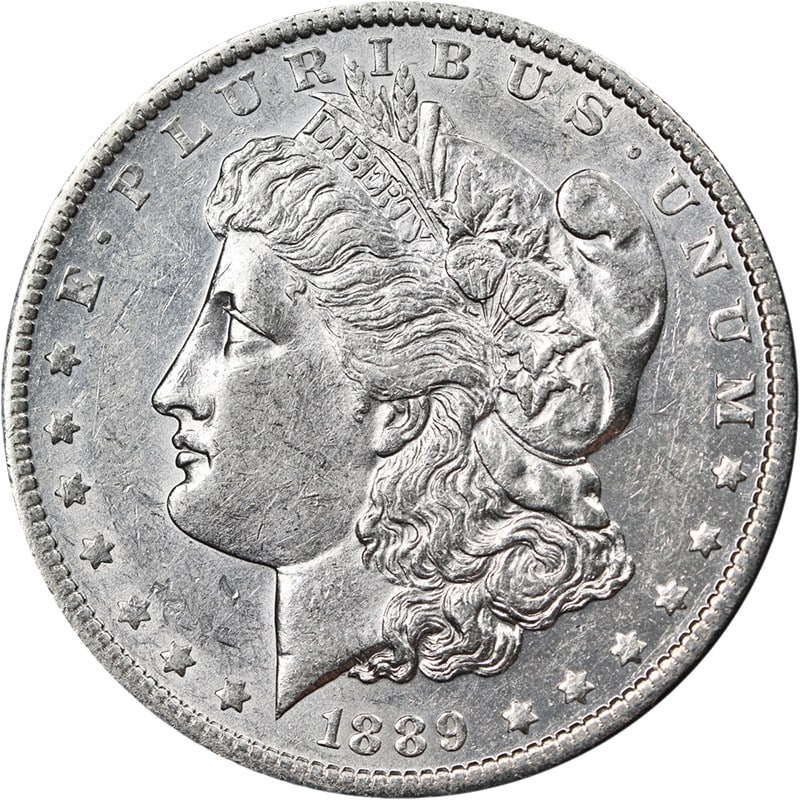 1889 O Morgan Silver Dollar Oval O Choice AU BU: 1889 O Morgan Silver Dollar Oval O Choice AU BU This 1889-O Morgan Silver Dollar features an oval 'O' mint mark and is graded Choice AU/BU. It displays attractive eye appeal with bright white luster, 