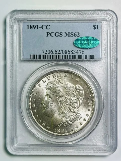 1891 Carson City Morgan Dollar PCGS MS62 CAC: 1891 Carson City Morgan Dollar PCGS MS62 CAC This 1891 Carson City Morgan Silver Dollar is graded MS-62 by PCGS and features CAC approval, indicating its quality within the grade. Struck at the Carson
