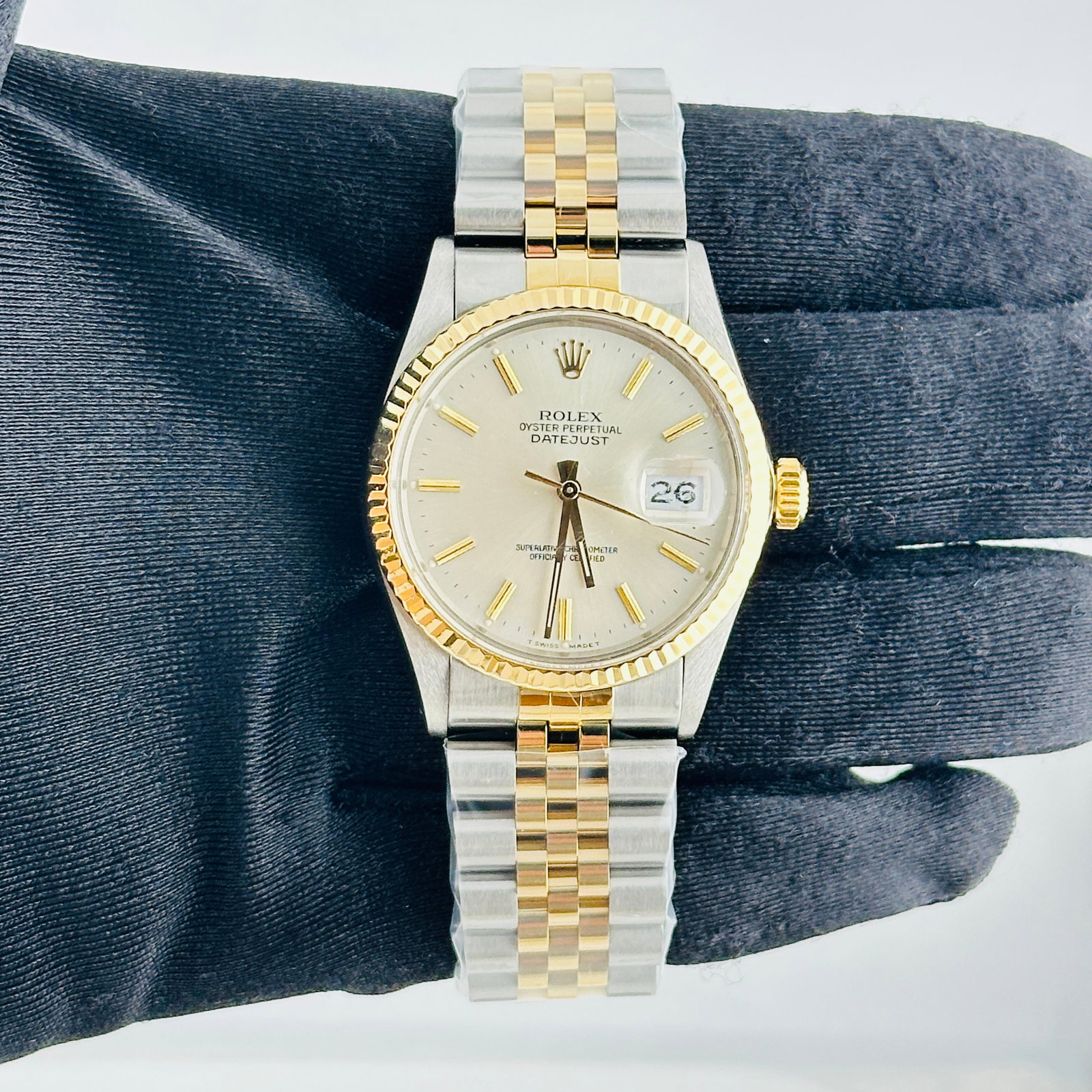 Rolex Datejust 16013 mens watch silver gold stick dial aftermarket Jubilee: Rolex Datejust 16013 mens watch silver gold stick dial aftermarket Jubilee Rolex Datejust reference 16013 with a silver and gold stick dial, fluted bezel, and Aftermarket Jubilee bracelet. This men's 