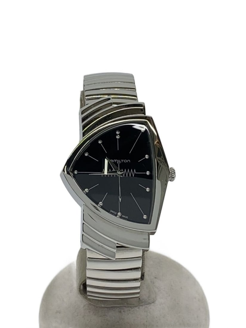 Hamilton Ventura Black Stainless Steel Quartz Men's Wristwatch: Hamilton Ventura Black Stainless Steel Quartz Men's Wristwatch This is a Hamilton Ventura Quartz H244112 men's wristwatch featuring a black dial and a stainless steel case and band. Made in Switzerlan