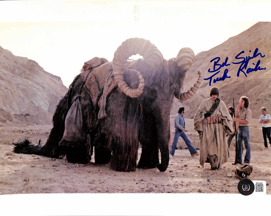 Bob Spiker Signed 8x10 Tusken Raider Photo Beckett Certified: Bob Spiker Signed 8x10 Tusken Raider Photo Beckett Certified This is an authentic autographed 8x10 color photograph of Bob Spiker, known for his role as the Tusken Raider in Star Wars. The photograph 