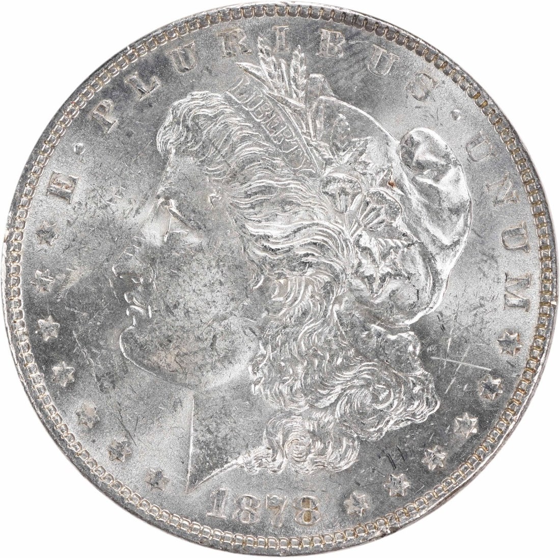 Uncirculated 1878 Silver Dollar Morgan 7 Tail Feathers Reverse BU Uncertified: Uncirculated 1878 Silver Dollar Morgan 7 Tail Feathers Reverse BU Uncertified This is a pre-owned 1878 Morgan Silver Dollar featuring the 7 Tail Feathers Reverse of 1878. The coin is uncirculated and 