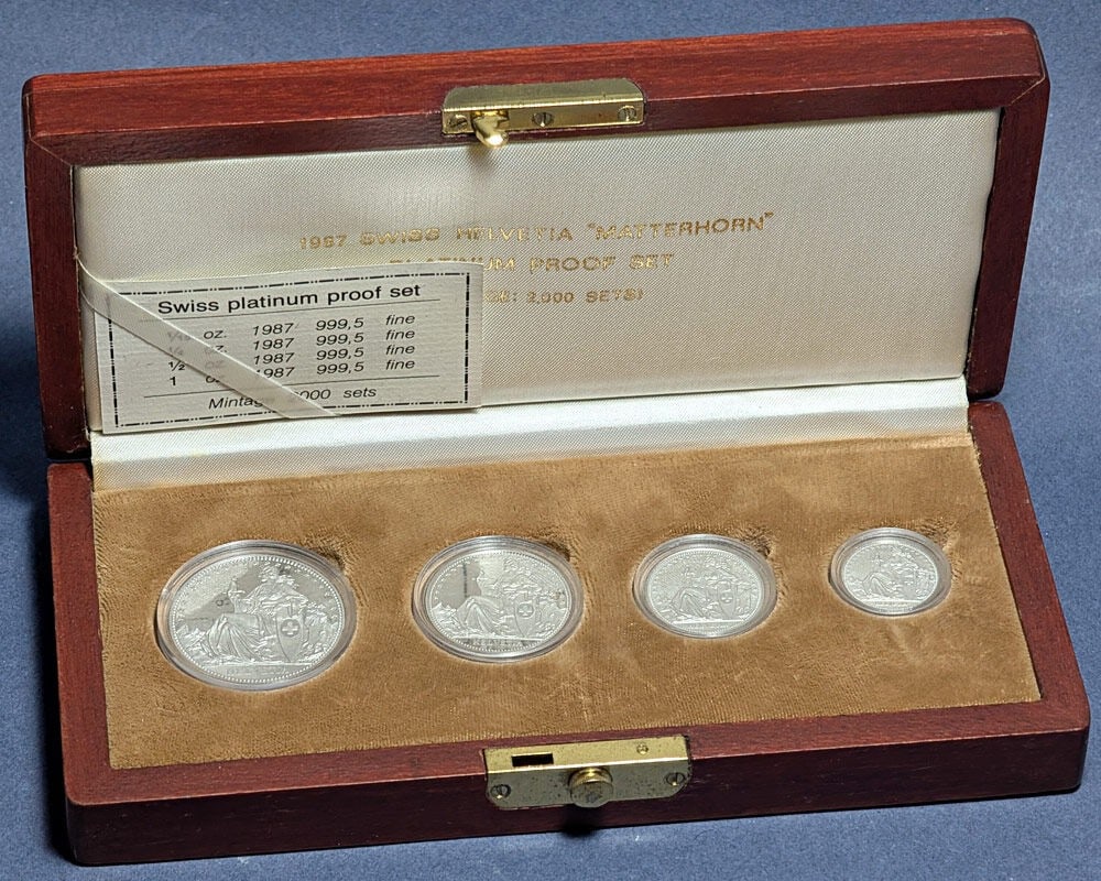 4 Coin Proof Platinum Set Switzerland 1987 Matterhorn 1.85 APW: 4 Coin Proof Platinum Set Switzerland 1987 Matterhorn 1.85 APW This 1987 Switzerland 4 Coin Proof Platinum Set features the Matterhorn design and is composed of platinum with a fineness of 0.9995. The