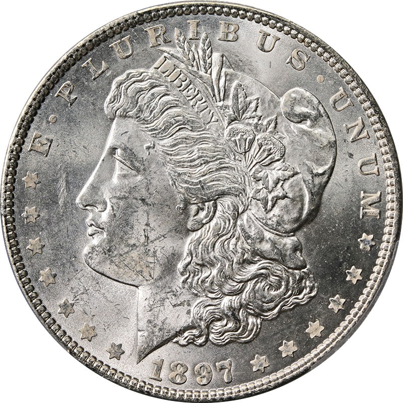 PCGS MS63 1897 Morgan Dollar VAM 6A Pitted Reverse Uncirculated Silver Coin: PCGS MS63 1897 Morgan Dollar VAM 6A Pitted Reverse Uncirculated Silver Coin This original 1897-P Morgan Silver Dollar is a VAM 6A variety featuring a pitted reverse. Graded PCGS MS63, it showcases imp