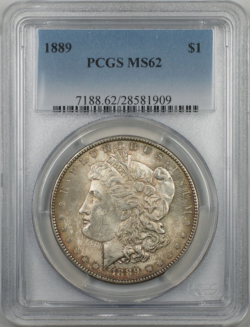 PCGS MS62 1889 Morgan Dollar Silver Coin with Attractive Toning: PCGS MS62 1889 Morgan Dollar Silver Coin with Attractive Toning This 1889 Morgan Silver Dollar is graded MS-62 by PCGS and features attractive toning. Struck in Philadelphia, it is composed of silver 