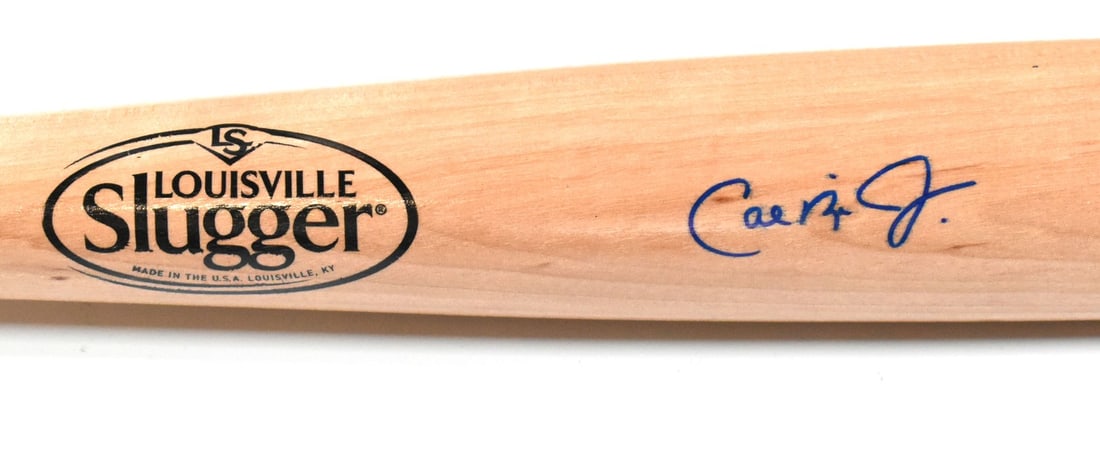 Autographed Louisville Slugger bat by Cal Ripken Jr Baltimore Orioles (1 of 2)