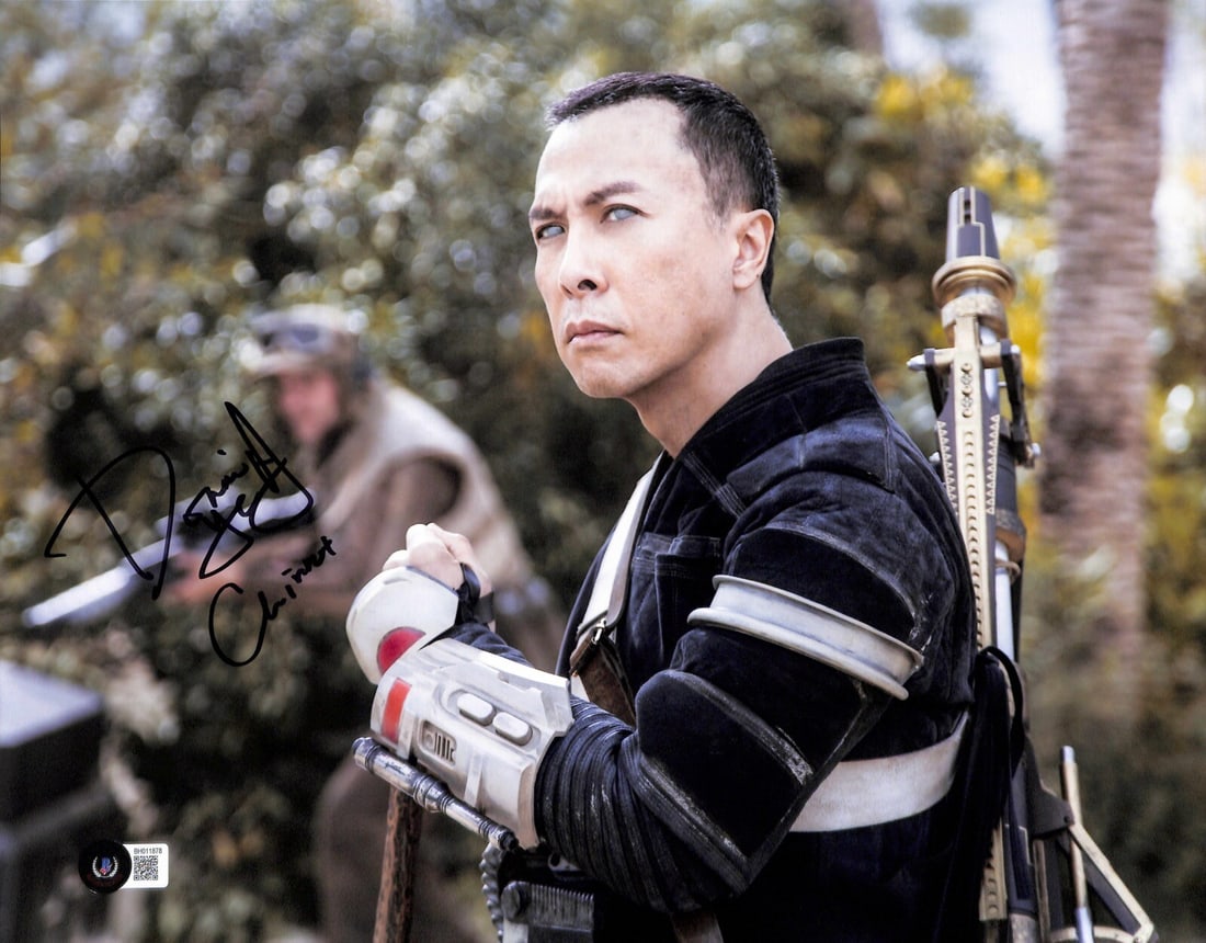 Autographed 11x14 Photo Donnie Yen as Chirrut Imwe Beckett Certified: Autographed 11x14 Photo Donnie Yen as Chirrut Imwe Beckett Certified This 11x14 photograph features Donnie Yen as "Chirrut Imwe" from the film Rogue One: A Star Wars Story. The photo is hand-signed an