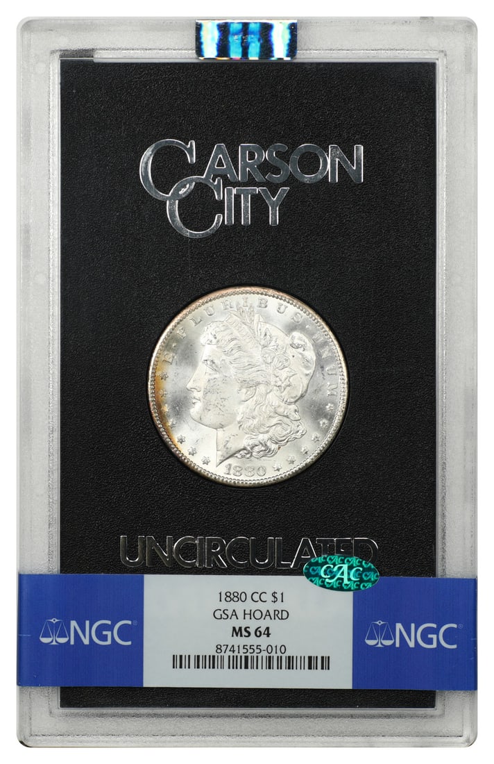 1880 Carson City Morgan Dollar $1 NGC MS64 CAC GSA Case: 1880 Carson City Morgan Dollar $1 NGC MS64 CAC GSA Case An 1880-CC Morgan Dollar $1 certified by NGC and CAC graded MS64. This CC-mint GSA example is housed in the original hard case. Condition is pre