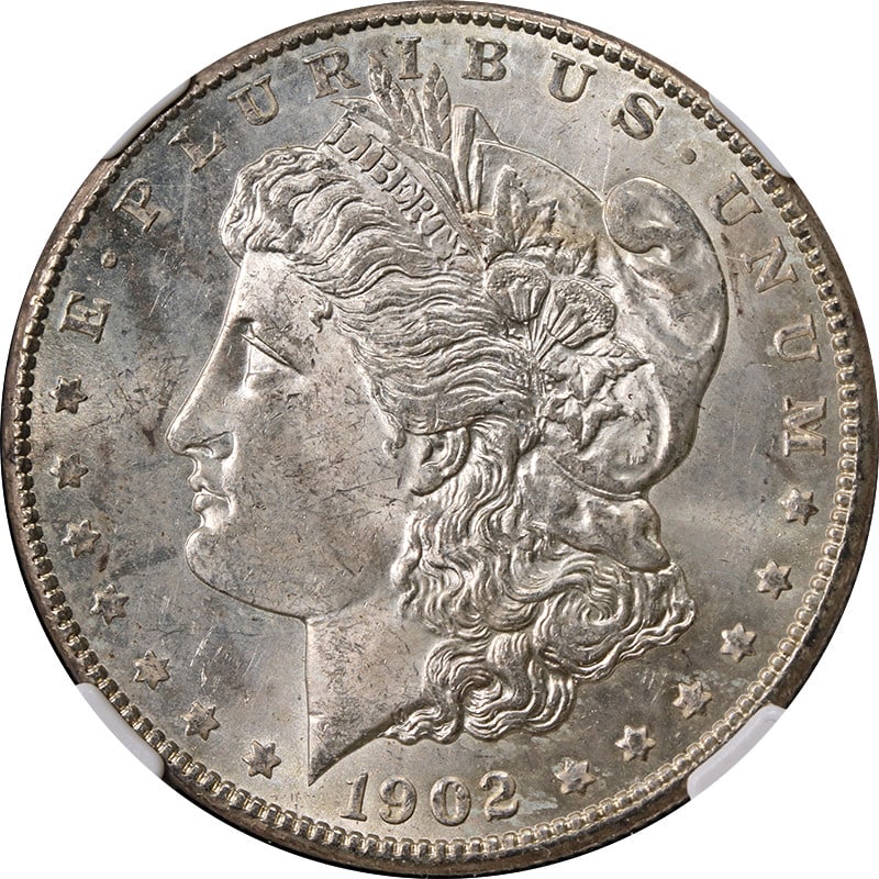 NGC MS63 1901-O Morgan Silver Dollar with Toned Surface: NGC MS63 1901-O Morgan Silver Dollar with Toned Surface This is a 1901-O Morgan Silver Dollar graded MS63 by NGC. The coin is uncirculated, features attractive toning, and was minted in New Orleans. I