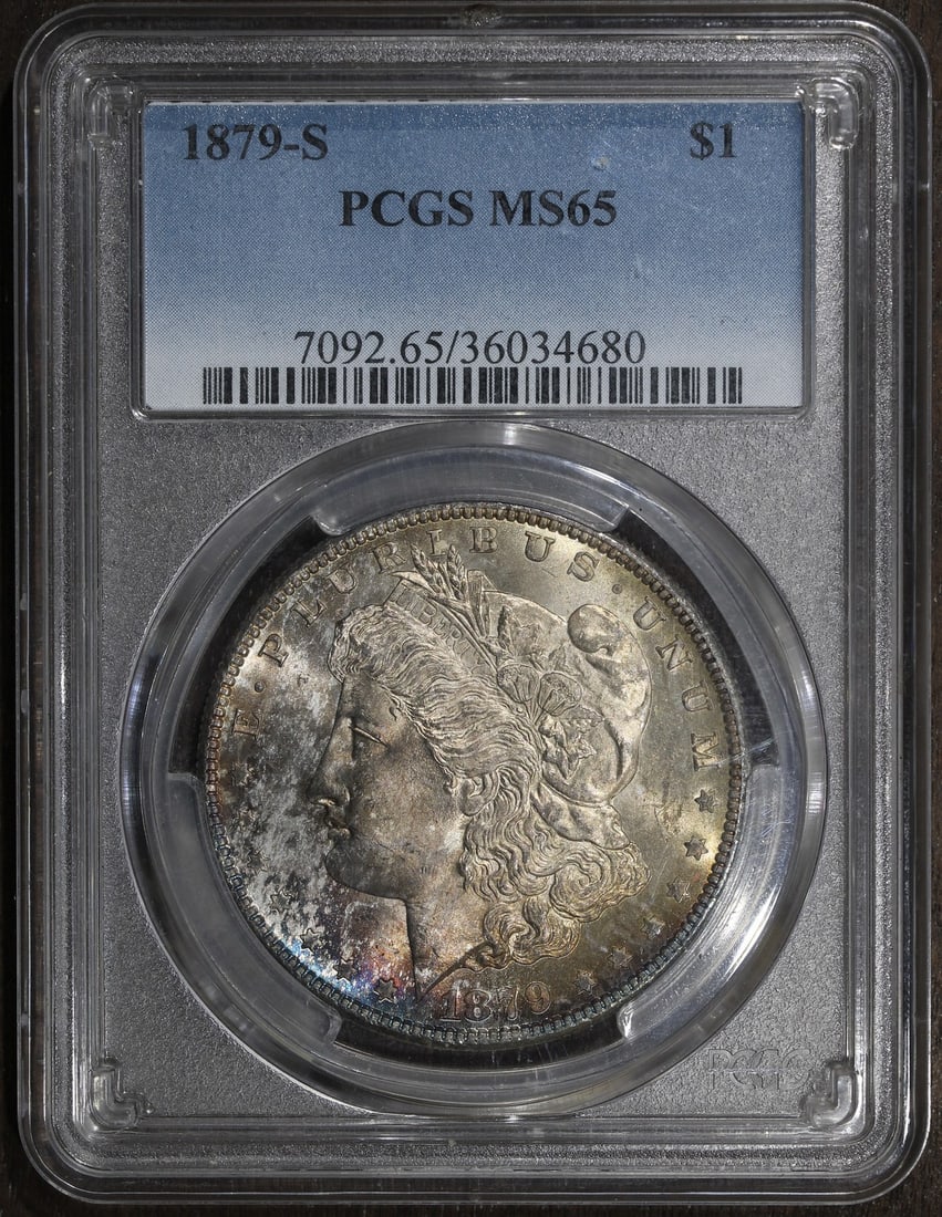 PCGS MS65 1879 San Francisco Morgan Dollar Silver Coin with Attractive Toning: PCGS MS65 1879 San Francisco Morgan Dollar Silver Coin with Attractive Toning This 1879-S Morgan Silver Dollar features a grade of MS65, certified by PCGS. Struck in San Francisco, the coin is compose