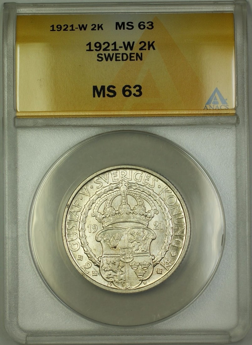 ANACS MS-63 1921-W Sweden Silver 2 Kronor Coin: ANACS MS-63 1921-W Sweden Silver 2 Kronor Coin This 1921-W Sweden 2 Kronor silver coin is certified by ANACS with a grade of MS-63, indicating it is in uncirculated condition. The coin is composed of 