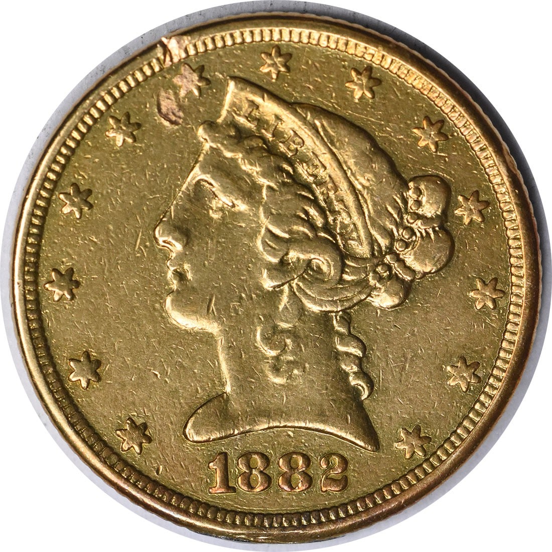 1882 $5 Gold Liberty Head Coin by Christian Gobrecht Uncertified: 1882 $5 Gold Liberty Head Coin by Christian Gobrecht Uncertified This 1882 $5 Gold Liberty Head coin is a captivating piece of history, featuring a design by Christian Gobrecht. This coin is classifie