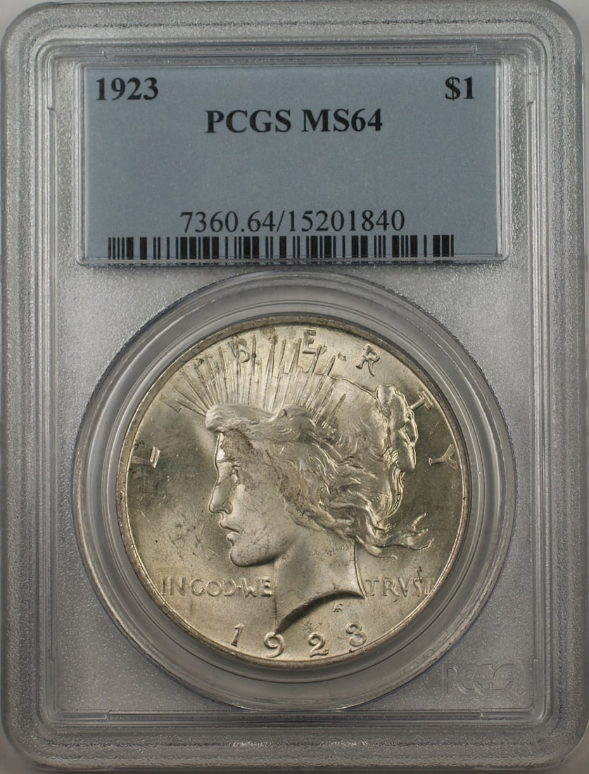 PCGS MS-64 1923 Peace Dollar Silver $1 Light Toning: PCGS MS-64 1923 Peace Dollar Silver $1 Light Toning 1923 Silver Peace Dollar $1 coin graded MS-64 by PCGS with light toning. It is an uncirculated United States coin with a silver composition and Phil