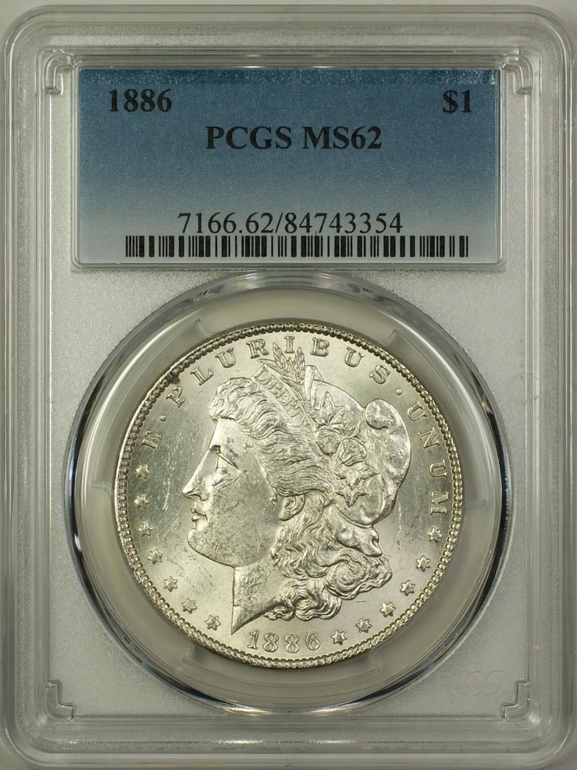 PCGS MS-62 1886 Morgan Dollar Silver Coin: PCGS MS-62 1886 Morgan Dollar Silver Coin This is an 1886 Morgan Silver Dollar graded MS-62 by PCGS. Minted in Philadelphia, this uncirculated coin is composed of silver and features the iconic Morgan