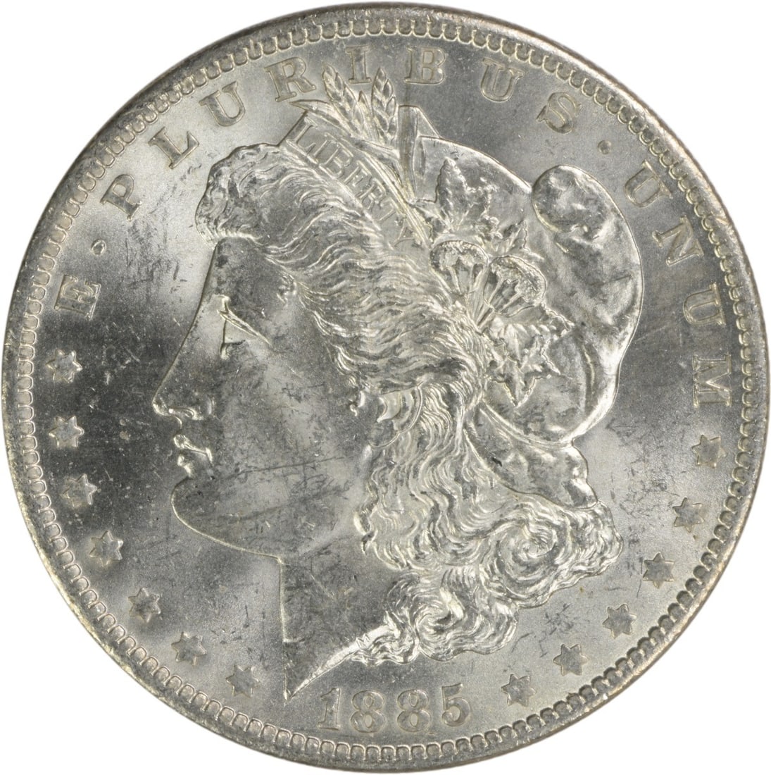 Choice BU 1885-O Silver Morgan Dollar Uncirculated Uncertified US Coin: Choice BU 1885-O Silver Morgan Dollar Uncirculated Uncertified US Coin This 1885-O Morgan Silver Dollar is a Choice Brilliant Uncirculated (BU) coin from the New Orleans Mint. Composed of silver, this