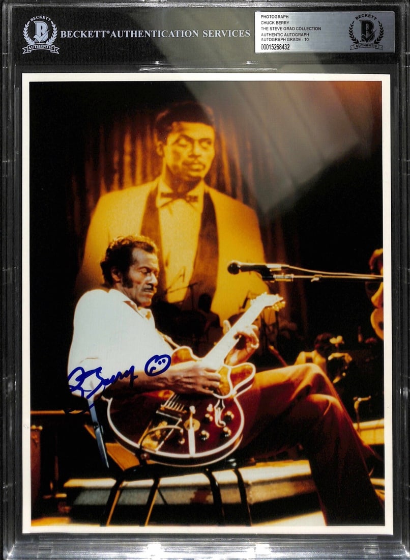 Chuck Berry Signed 8x10 Photo Autographed Grade 10 Beckett: Chuck Berry Signed 8x10 Photo Autographed Grade 10 Beckett This extraordinary 8x10 color photograph features the legendary Chuck Berry, who signed it in blue permanent marker. The autograph has been a