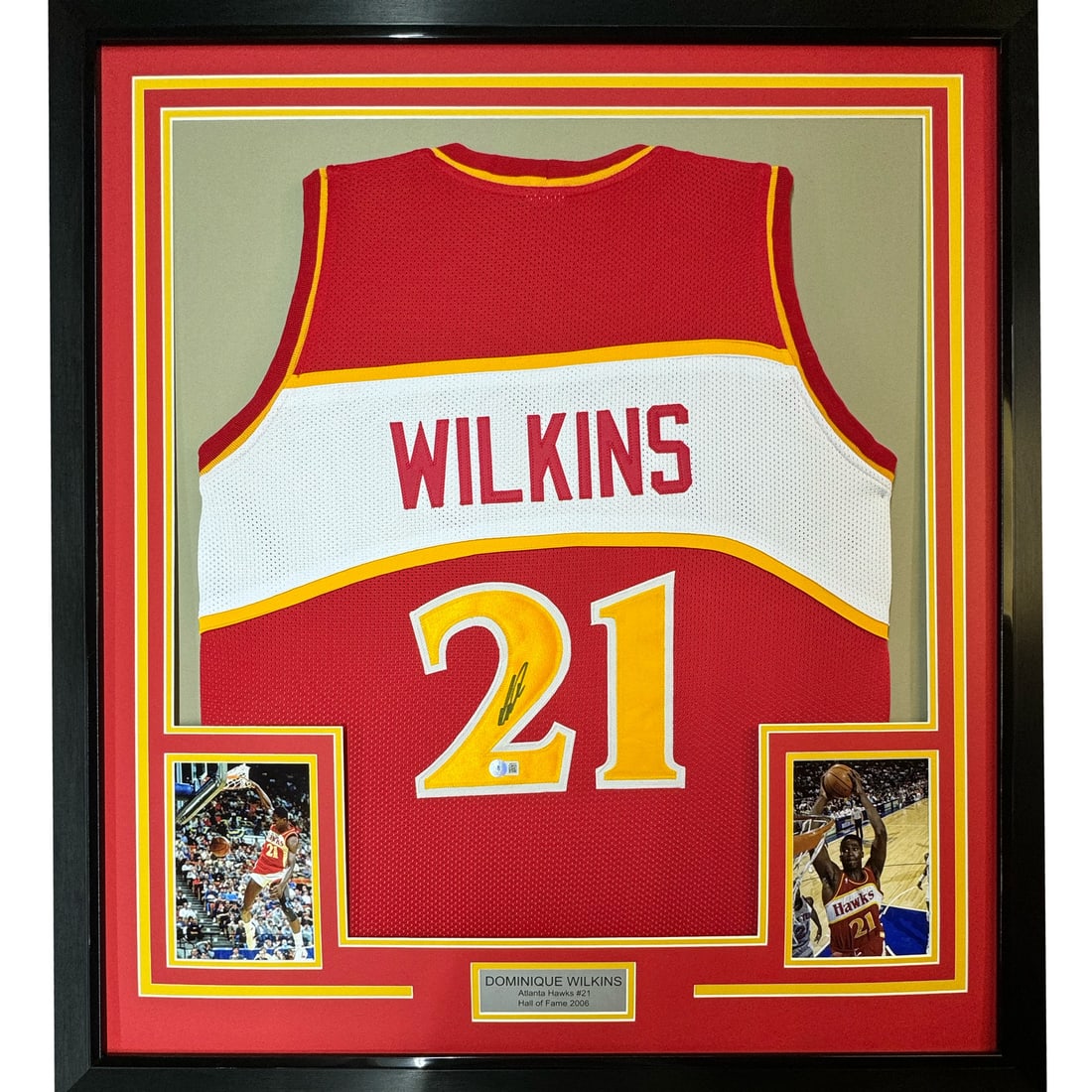 Framed Autographed Dominique Wilkins Atlanta Hawks Jersey PSA/DNA COA 33x42: Framed Autographed Dominique Wilkins Atlanta Hawks Jersey PSA/DNA COA 33x42 This stunning framed autographed jersey features Dominique Wilkins, an NBA legend and a key player for the Atlanta Hawks. Me