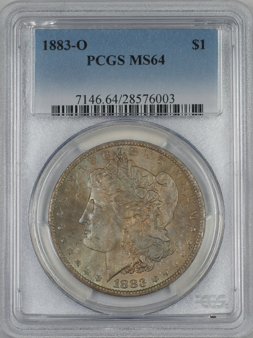 PCGS MS 64 1883-O Silver Morgan Dollar New Orleans with Toned Obverse: PCGS MS 64 1883-O Silver Morgan Dollar New Orleans with Toned Obverse This 1883-O Morgan Silver Dollar features a toned obverse and is certified by PCGS with a grade of MS 64. The coin was minted in N