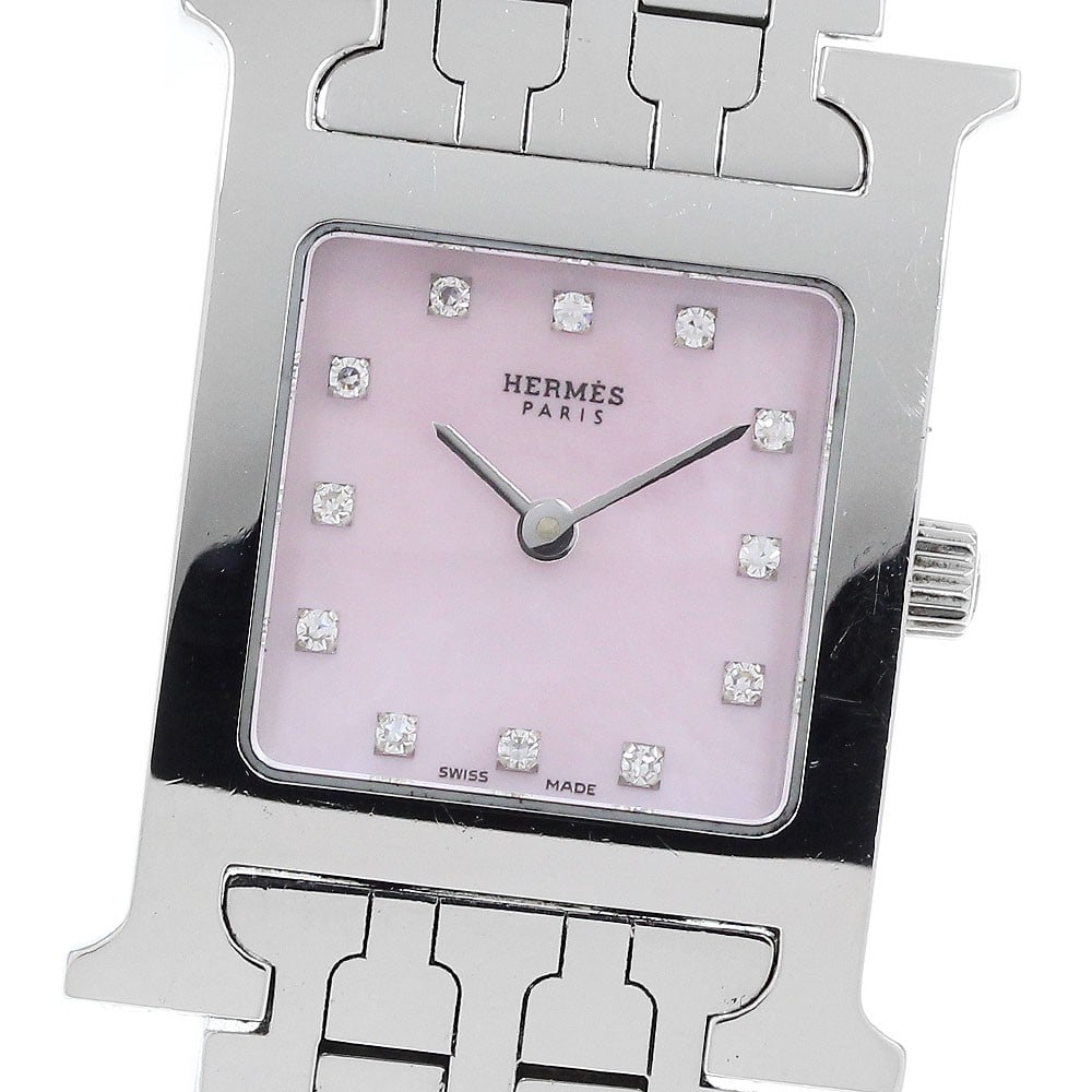 Hermes HH1.210 H Watch Womens Quartz Wristwatch 12 Diamond: Hermes HH1.210 H Watch Womens Quartz Wristwatch 12 Diamond Hermes H-Watch quartz women's wristwatch in pre-owned condition. The watch is identified as model HH1.210 and features a 12-diamond design. I