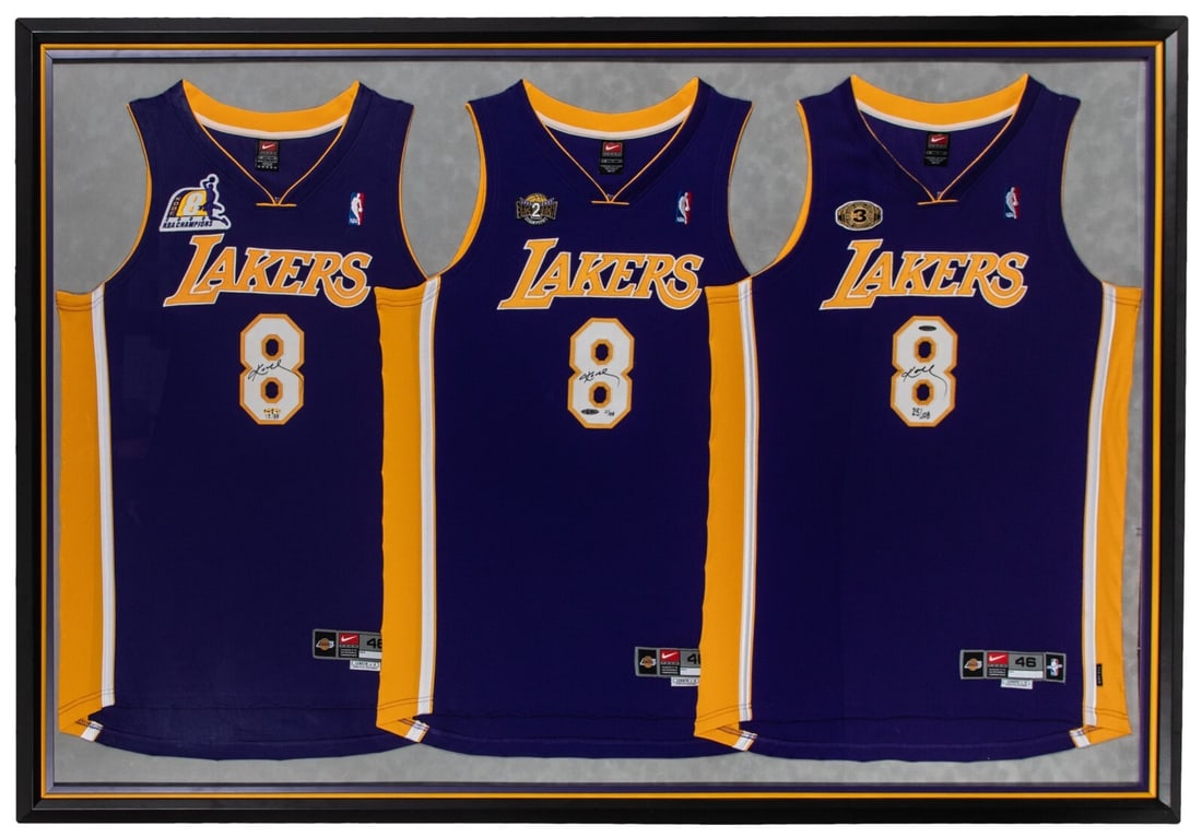 Kobe Bryant Signed NBA Finals Jersey Display with UDA Beckett COA: Kobe Bryant Signed NBA Finals Jersey Display with UDA Beckett COA This stunning display honors Kobe Bryant, one of the most iconic players in basketball history, featuring three signed Nike Authentic 